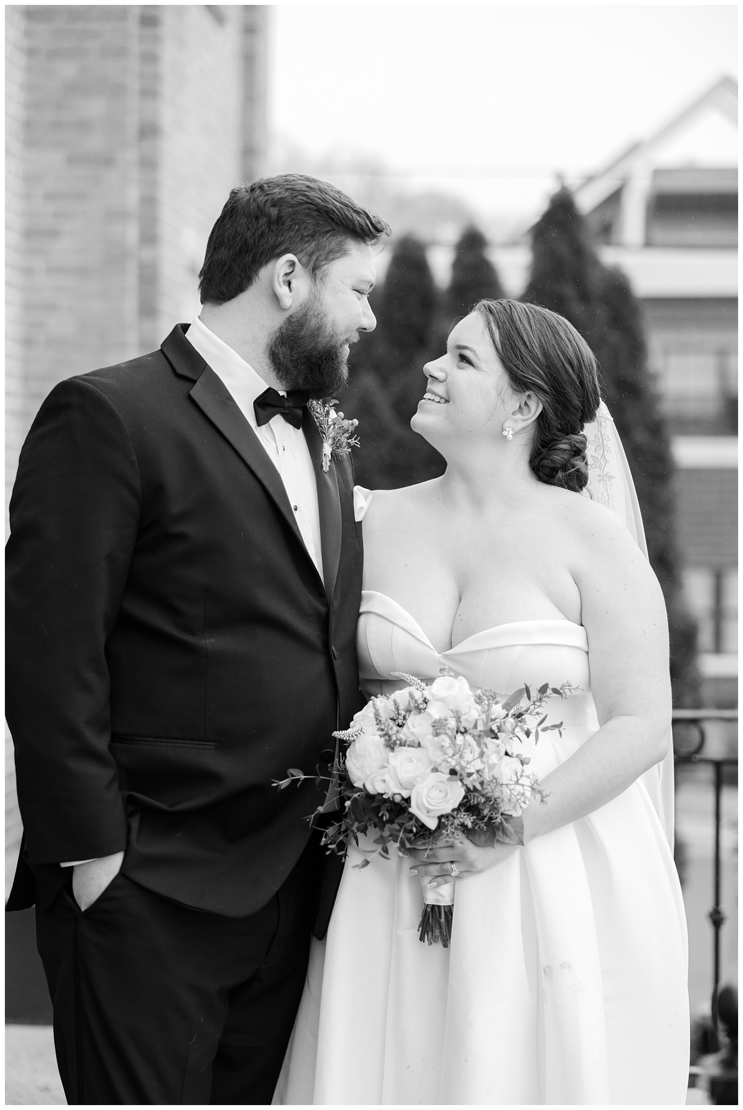 bride and groom looking at each other