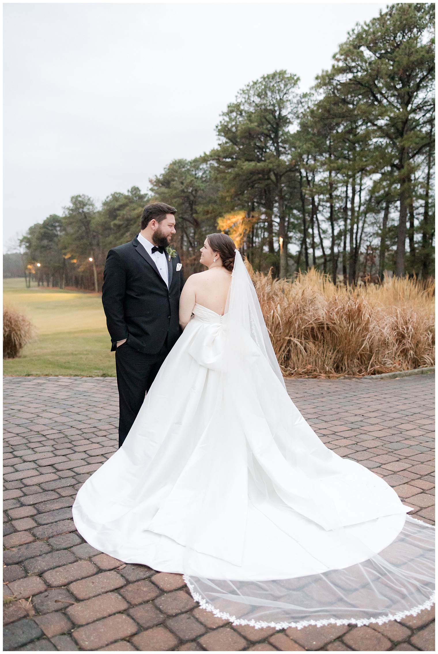 bride and groom posing