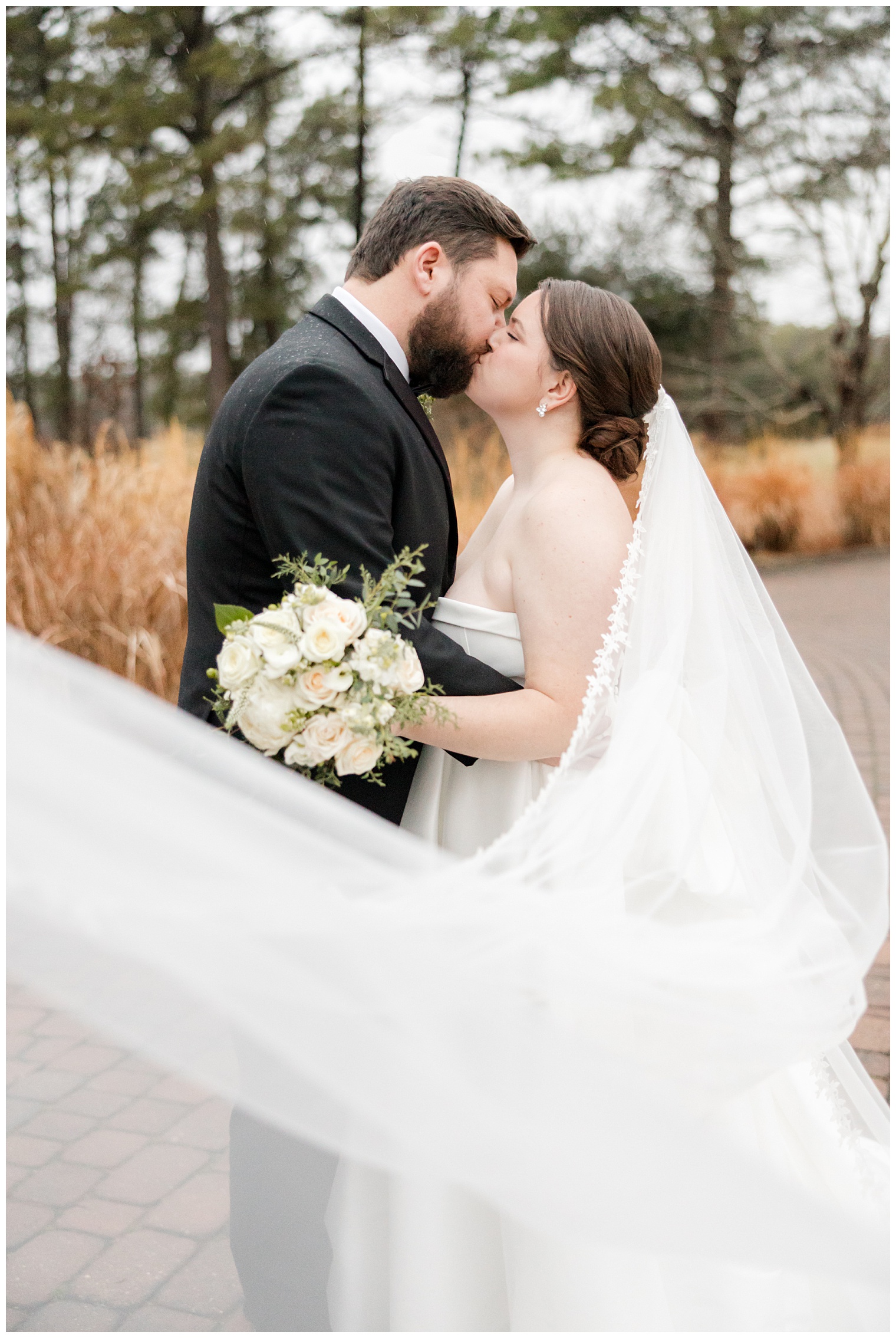 bride and groom kissing