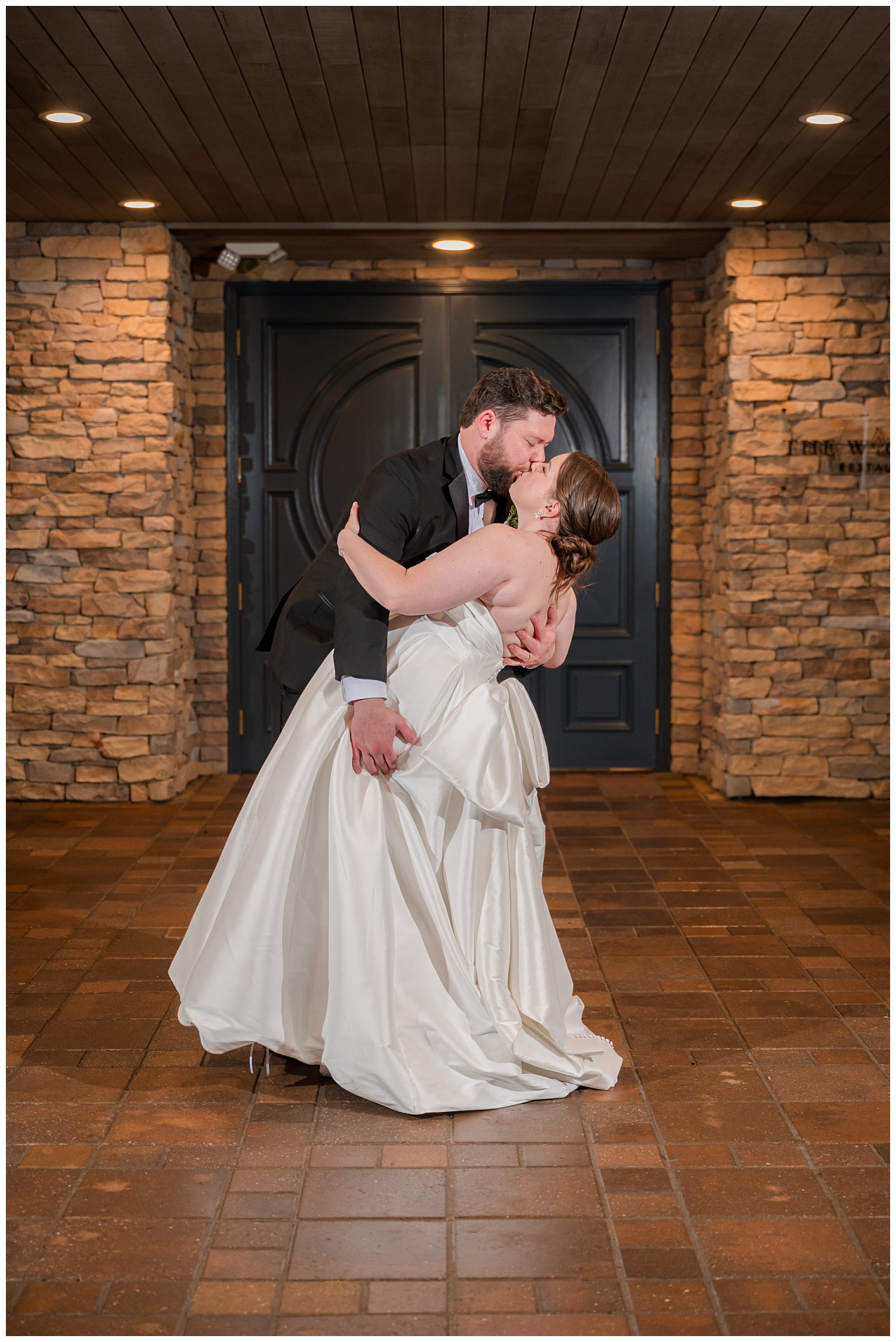 bride and groom kissing