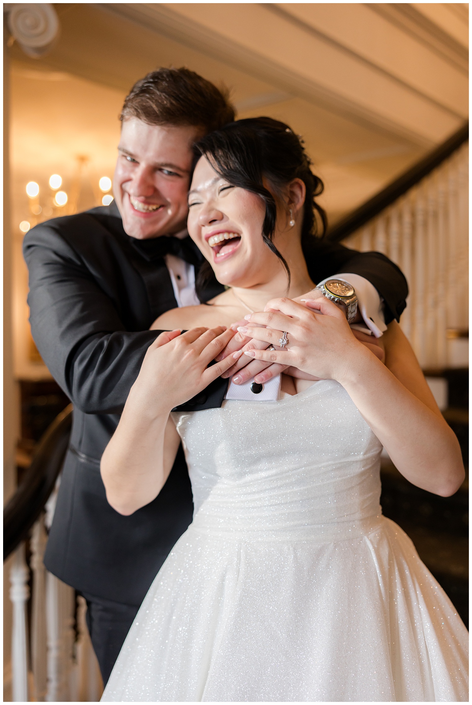 bride and groom laughing