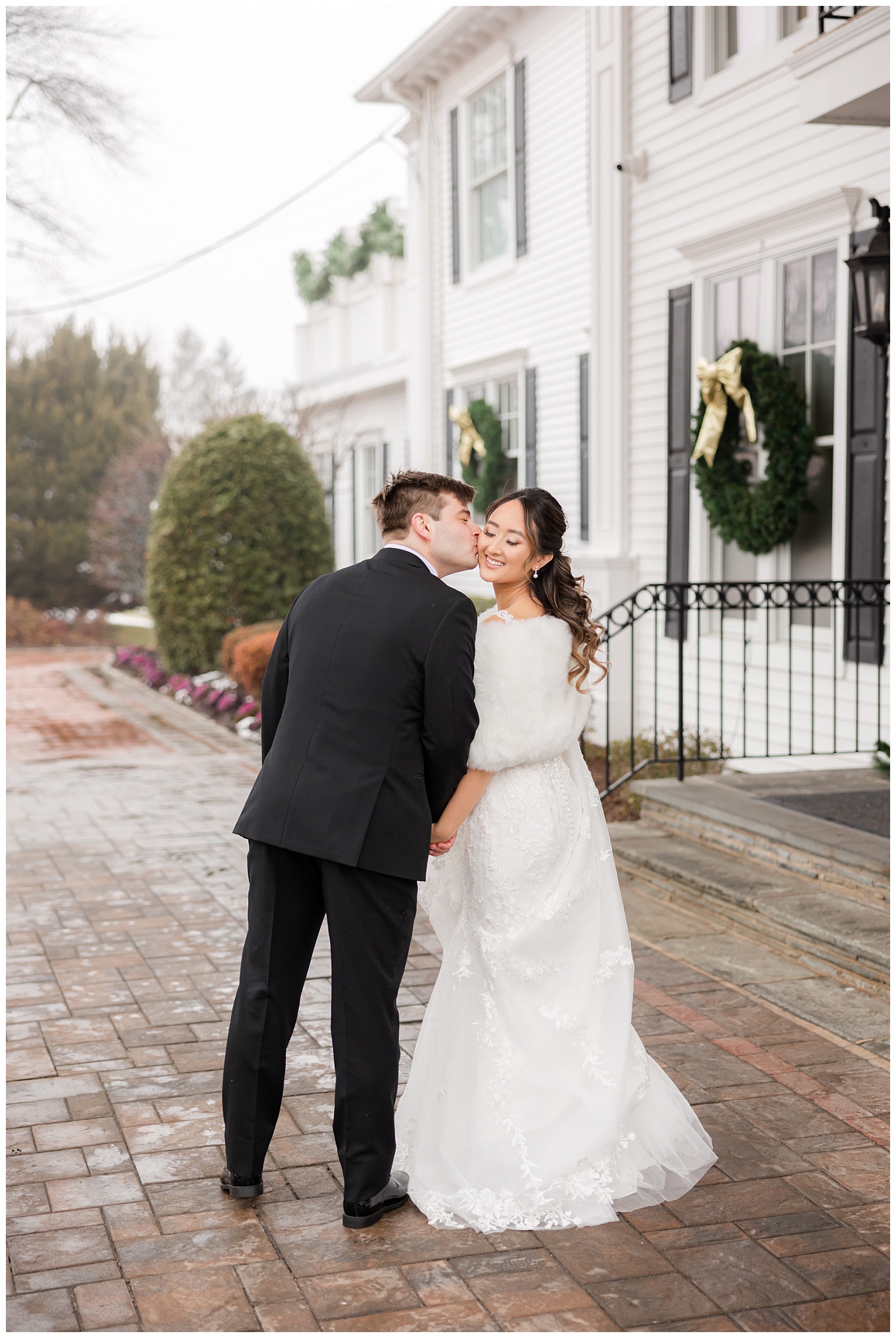 groom kissing the bride