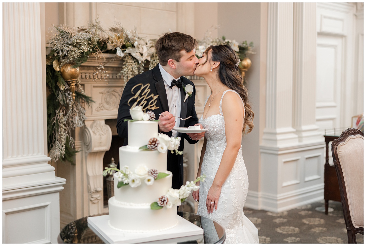 bride and groom cutting the wedding cake