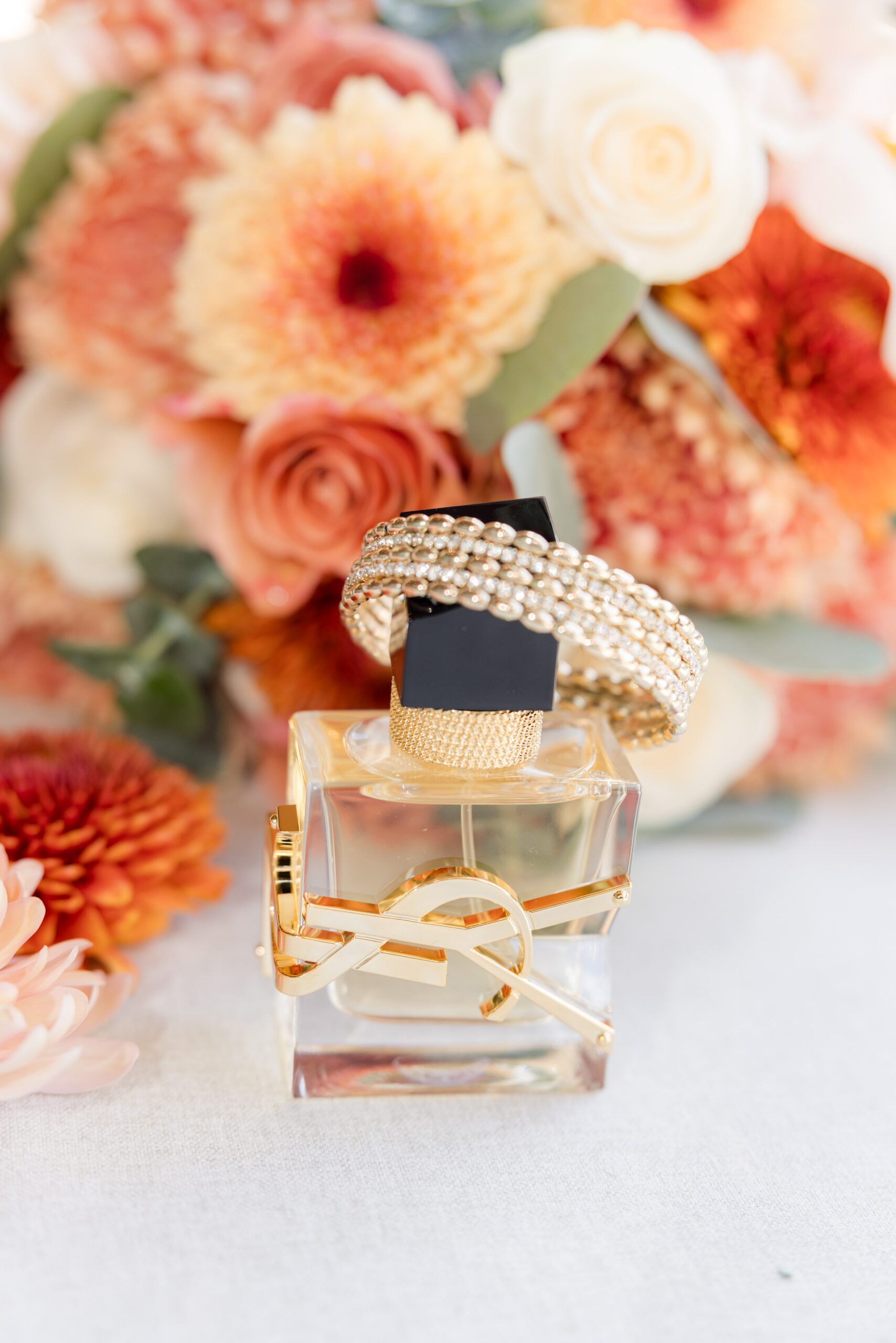 Wedding rings rest elegantly among blossoms, symbolizing eternal love