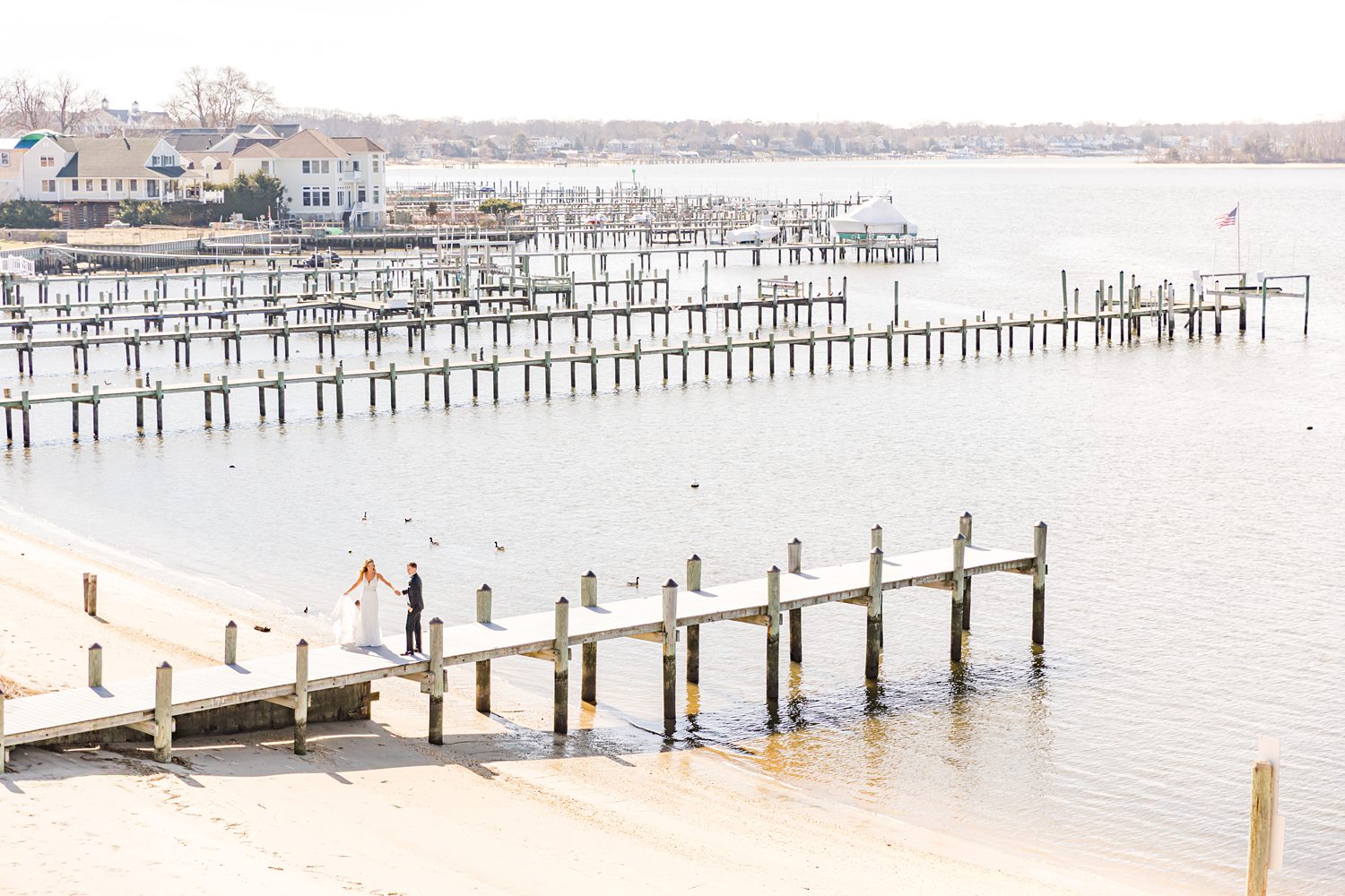 Scenic marina dock with calm waterfront view at luxury yacht club venue