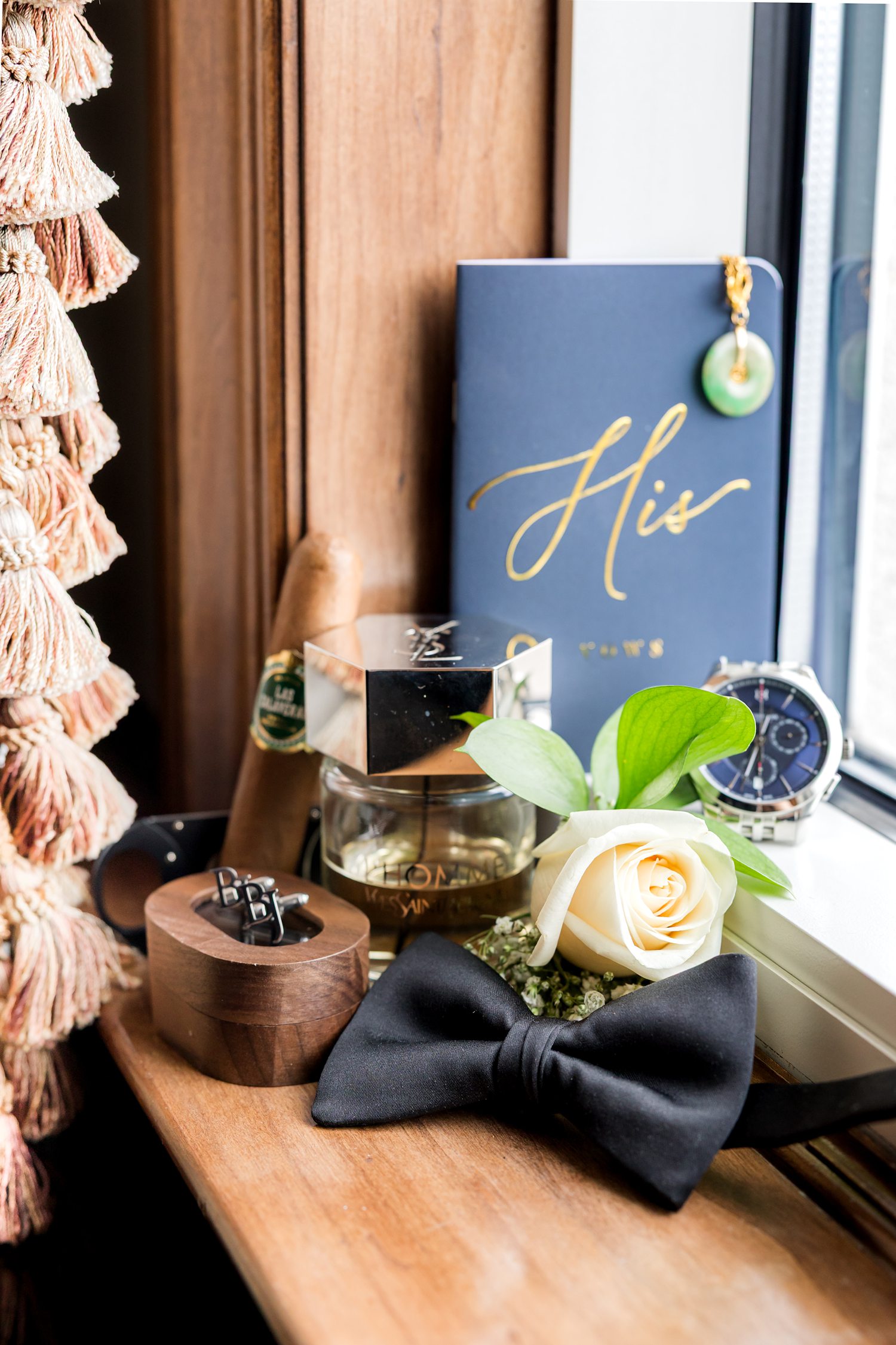Wedding detail styling with signature cocktail menu and elegant reception decor